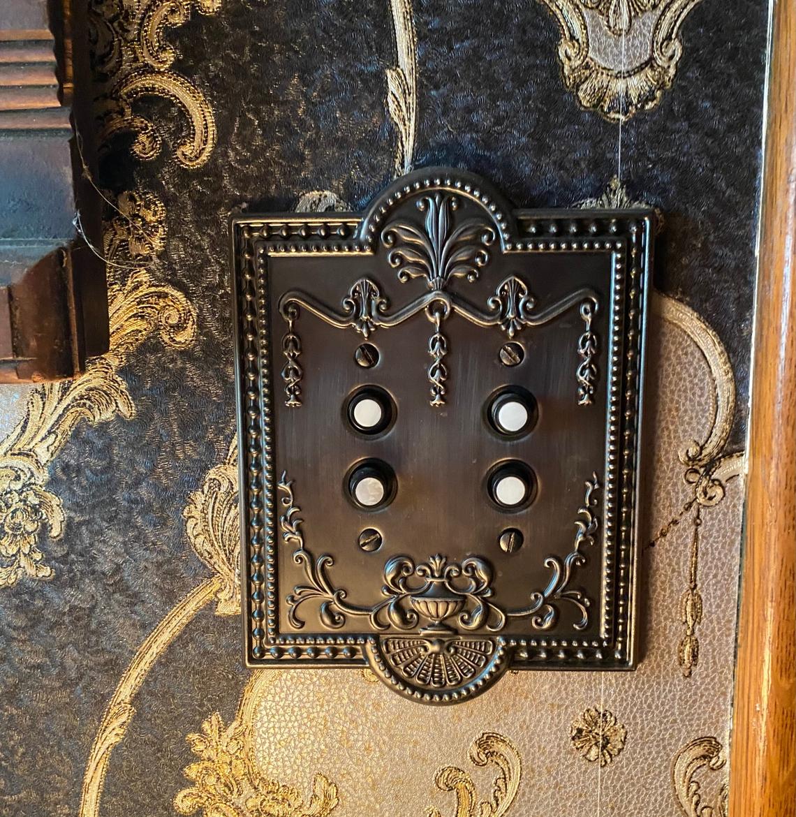 Ralph and June Rhodes had all the flip light switches replaced with period push-button light switches in the Wey Mansion.