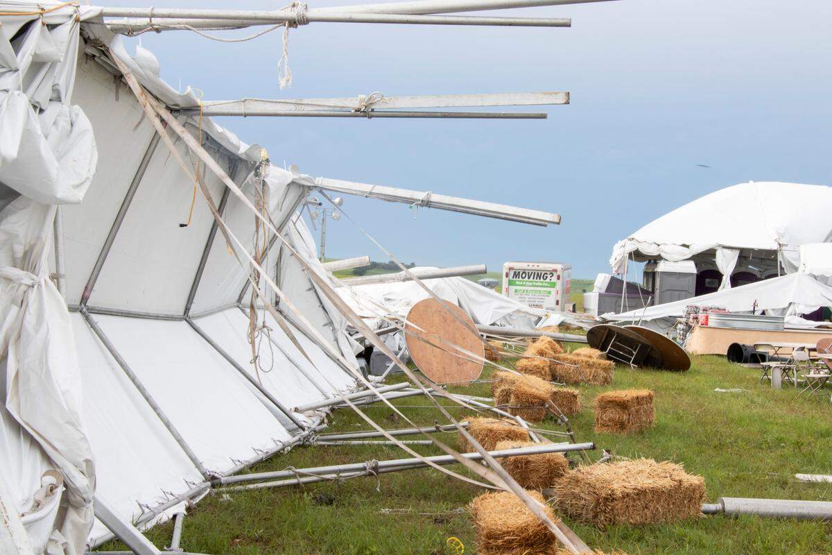 A tent is turned on its side at the planned site of the Symphony in the Flint Hills (photo by Brogan Gillmore, Flint Hills Media Project).
