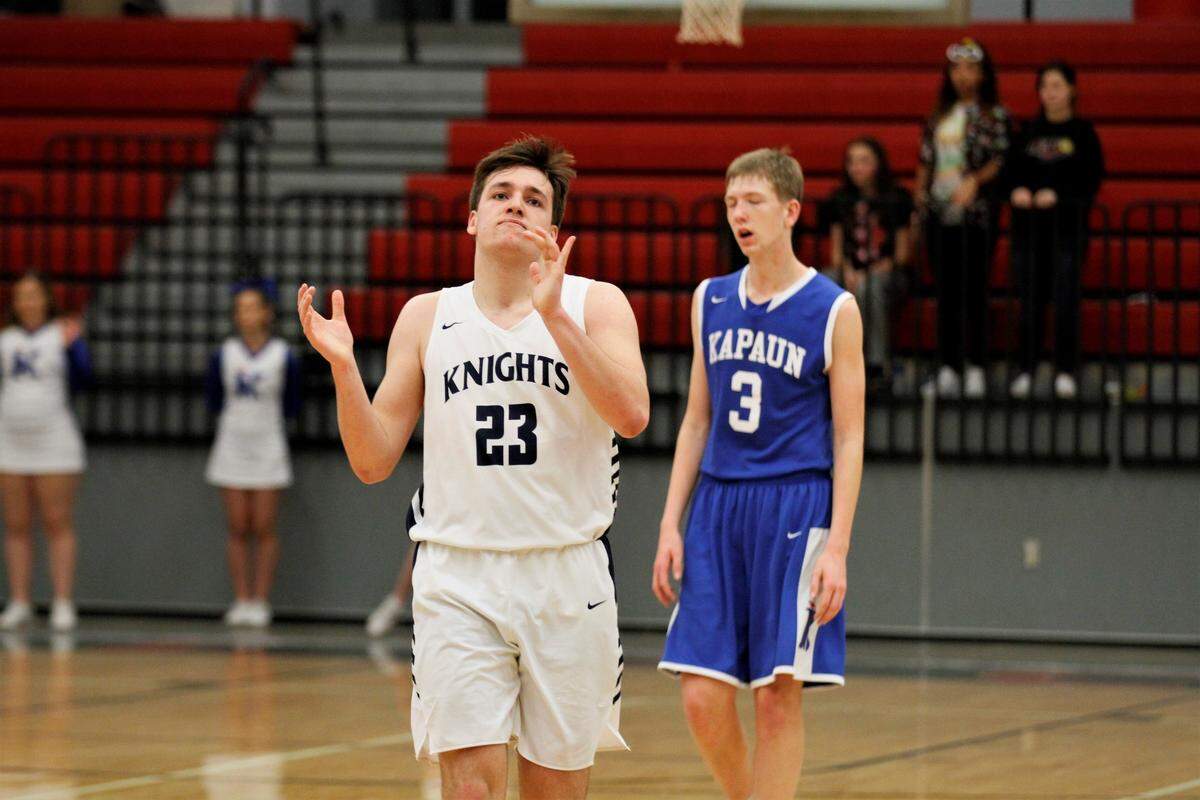 Trinity Academy senior forward Andrew Davis claps in celebration of a 68-55 win over Kapaun in the semifinals of the 2019 Bluestem Classic in El Dorado on Friday night. (Jan. 18, 2019)