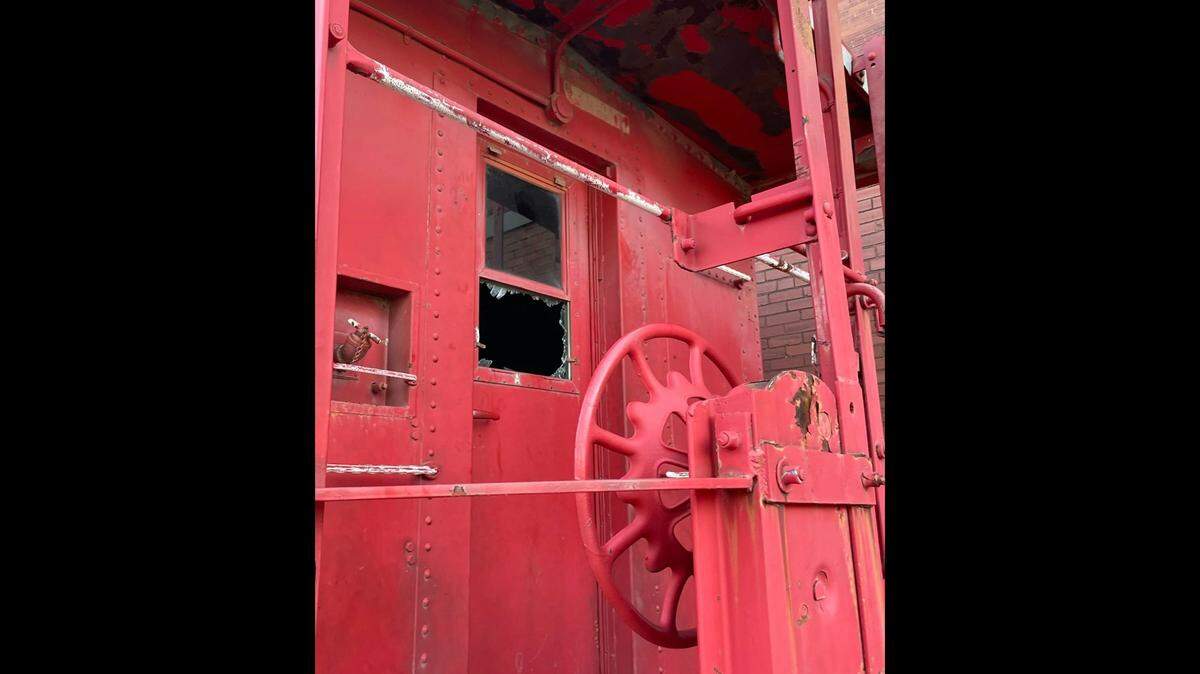 The building and multiple train cars, including this one at the Great Plains Transportation Museum in Old Town, were vandalized Saturday. Three teens have been arrested.