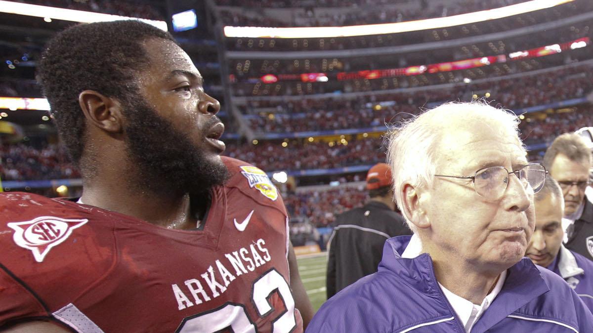 Kansas State coach Bill Snyder walks off the field after Arkansas won the Cotton Bowl 29-16. (Jan. 6, 2012)