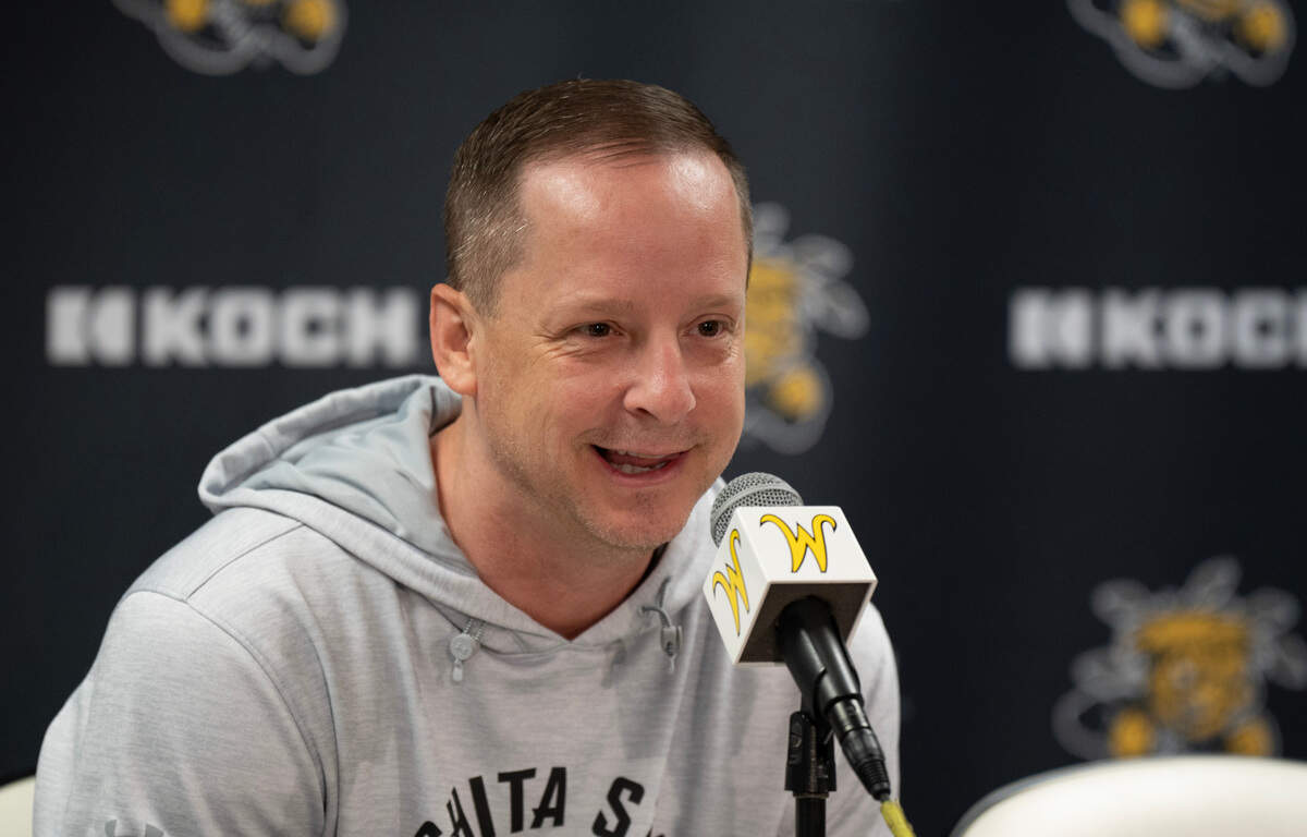 Wichita State men’s basketball coach Paul Mills speaks to the media at a press conference.