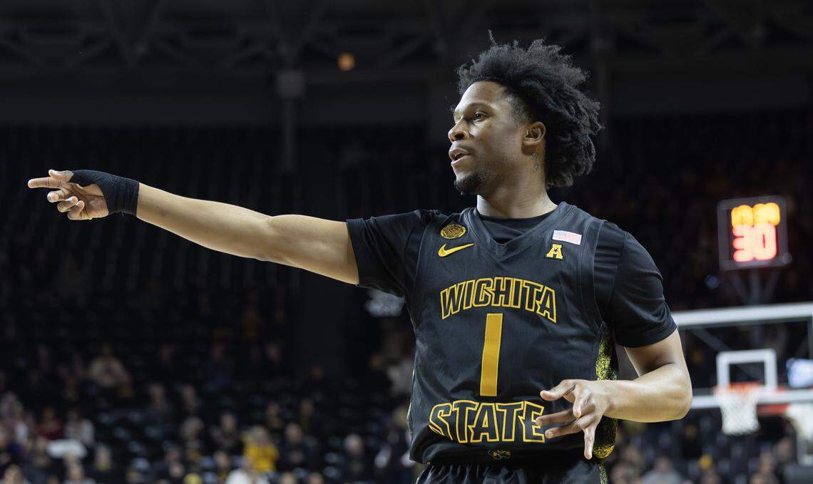 Wichita State’s Kenyon Giles celebrates a three-pointer during the first half against East Carolina on Wednesday night at Koch Arena.