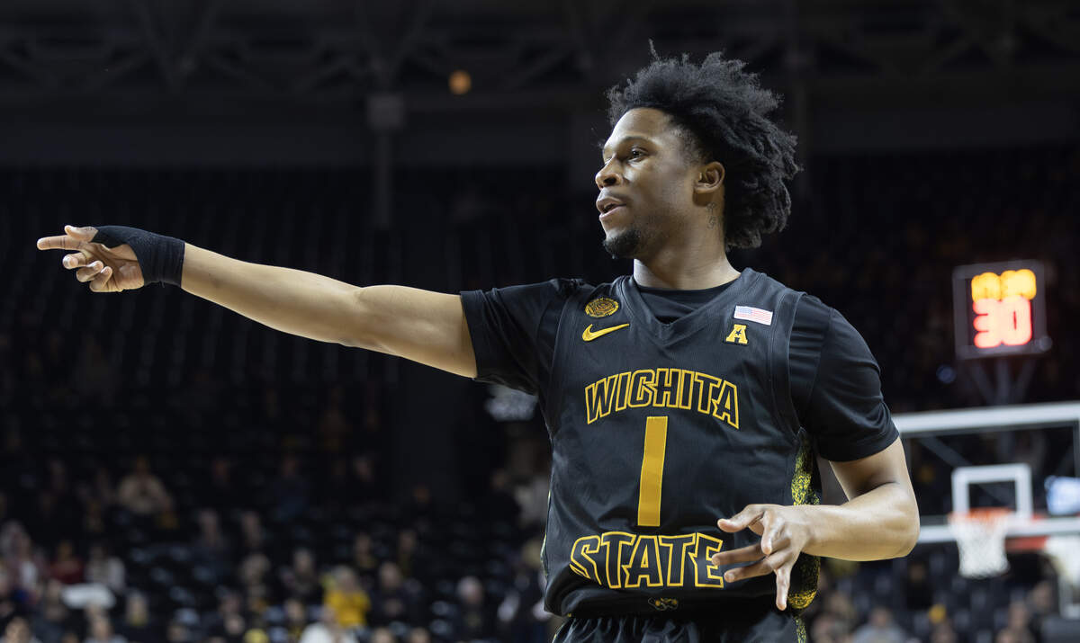 Wichita State’s Kenyon Giles celebrates a three-pointer during the first half against East Carolina on Wednesday night at Koch Arena.