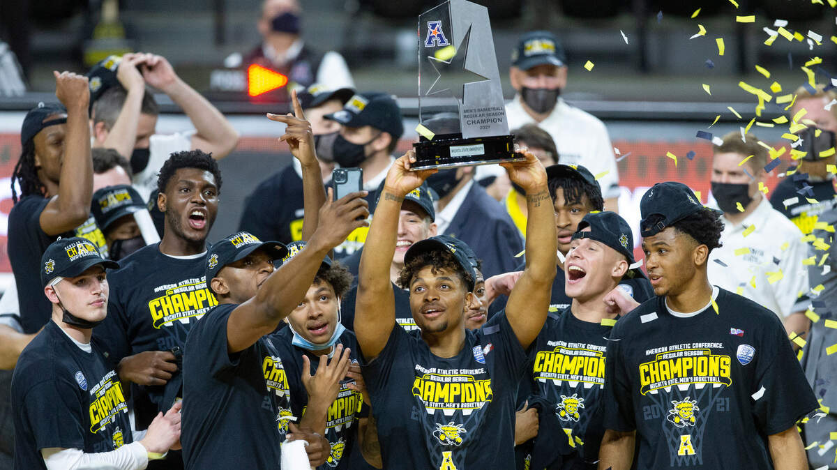 Wichita State celebrates winning the 2020-21 AAC conference title on Saturday.