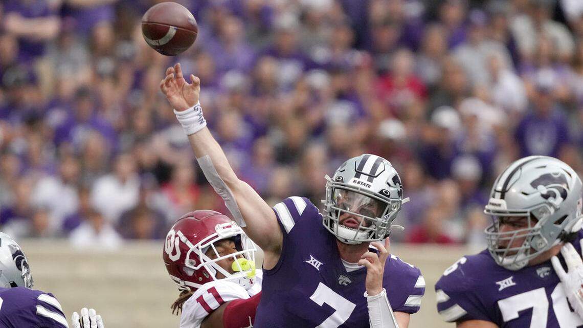 Kansas State quarterback Skylar Thompson passes while under pressure from Oklahoma linebacker Nik Bonitto during the first half in Manhattan, Kan., Saturday, Oct. 2 2021.