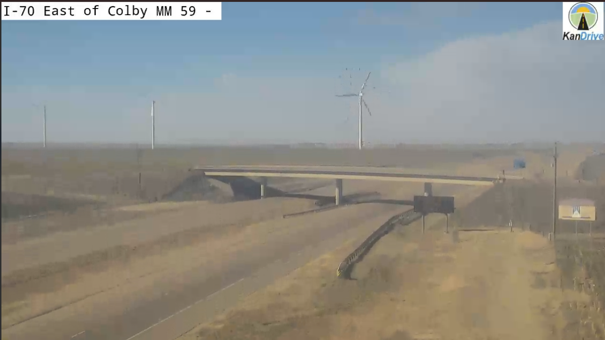 Highway cameras show that dust affected visibility on I-70 near a six-vehicle crash. This screenshot was taken around 2:45 p.m. Tuesday. One person died and four were injured. 