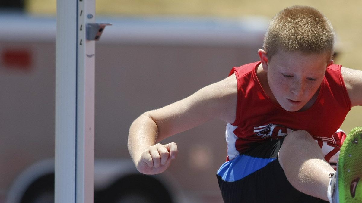 Triathelete Sam Hankins of Manhattan competes at the USATF Junior National Olympics at Cessna Stadium on Wednesday. (July 27, 2011)