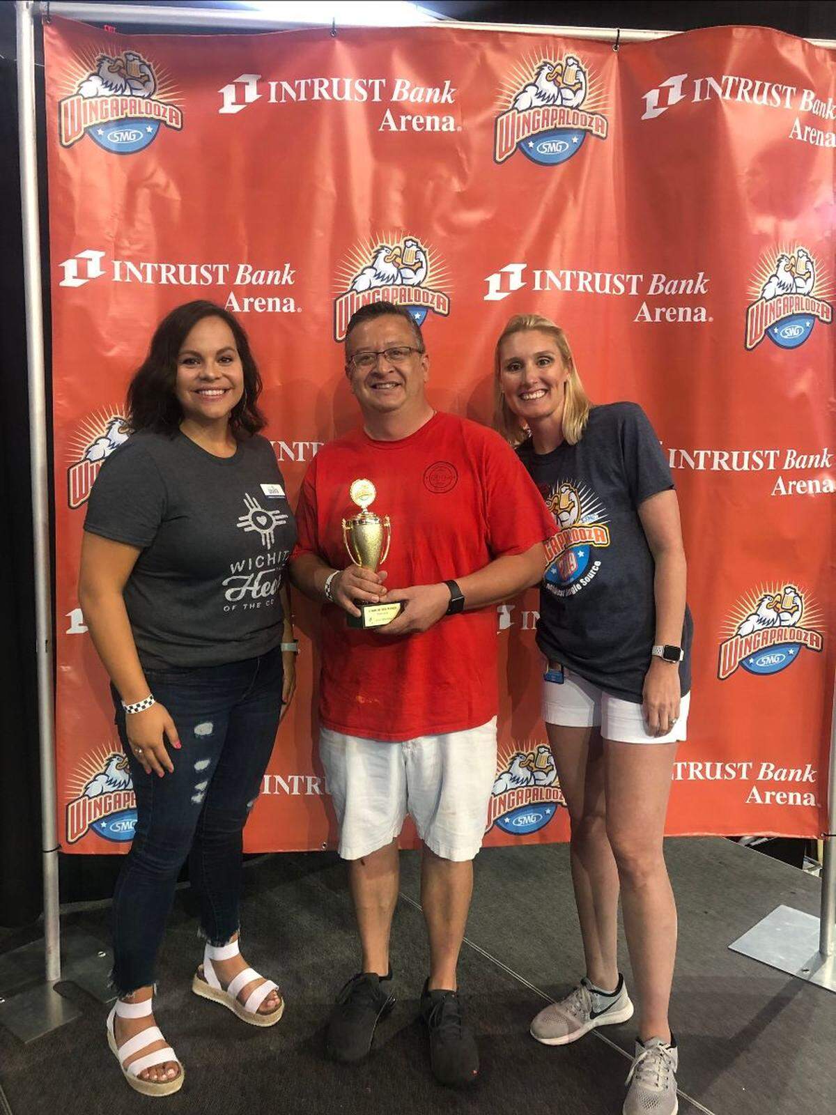 Chef Paul Guerrero accepts the Peoples Choice award on behalf of Reflection Ridge Golf Course at Saturday’s Wingapalooza.