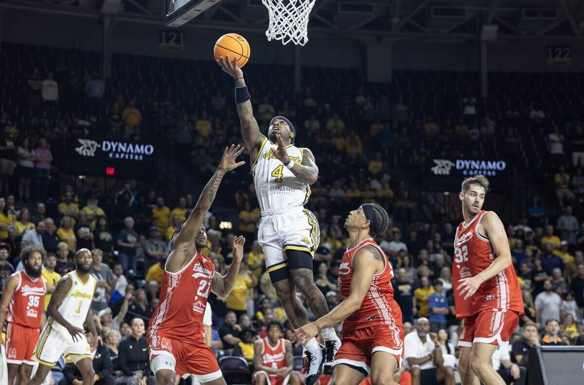 Marcus Keene drives in for a layup during the first half of their second game of the TBT tournament against The Enchantment at Koch Arena on Thursday night.