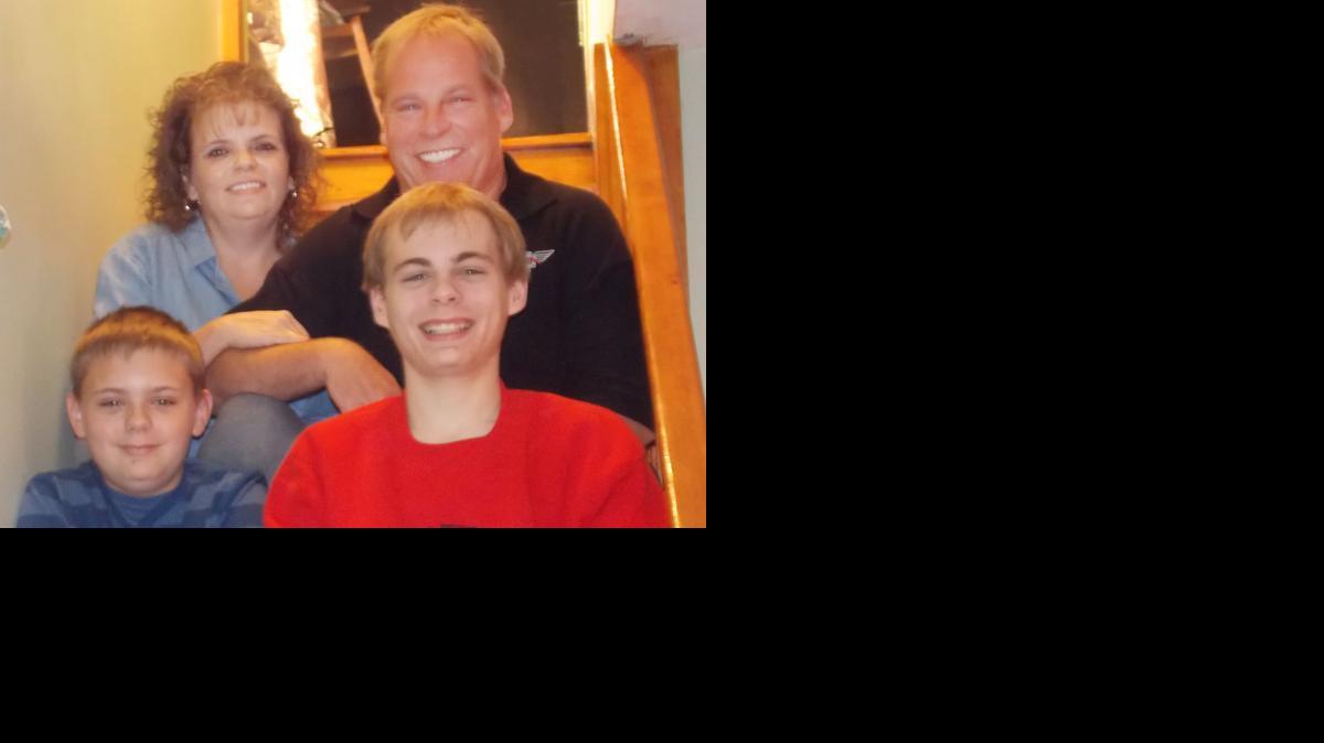 
Danielle Zimmerman, upper left, died after suffering a fatal brain aneurysm while in a Taco Bell drive-through on East Harry on Dec. 29. While she was unconscious, someone stole her belongings, including her wedding ring. She’s seen with her husband, Kris, and her two sons, Noah, 13, and Alex, 18.
