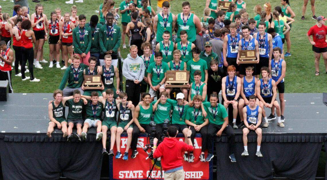 2019 Kansas Class 5A boys state track and field podium: De Soto (left), Bishop Carroll (center) and Andover (right)