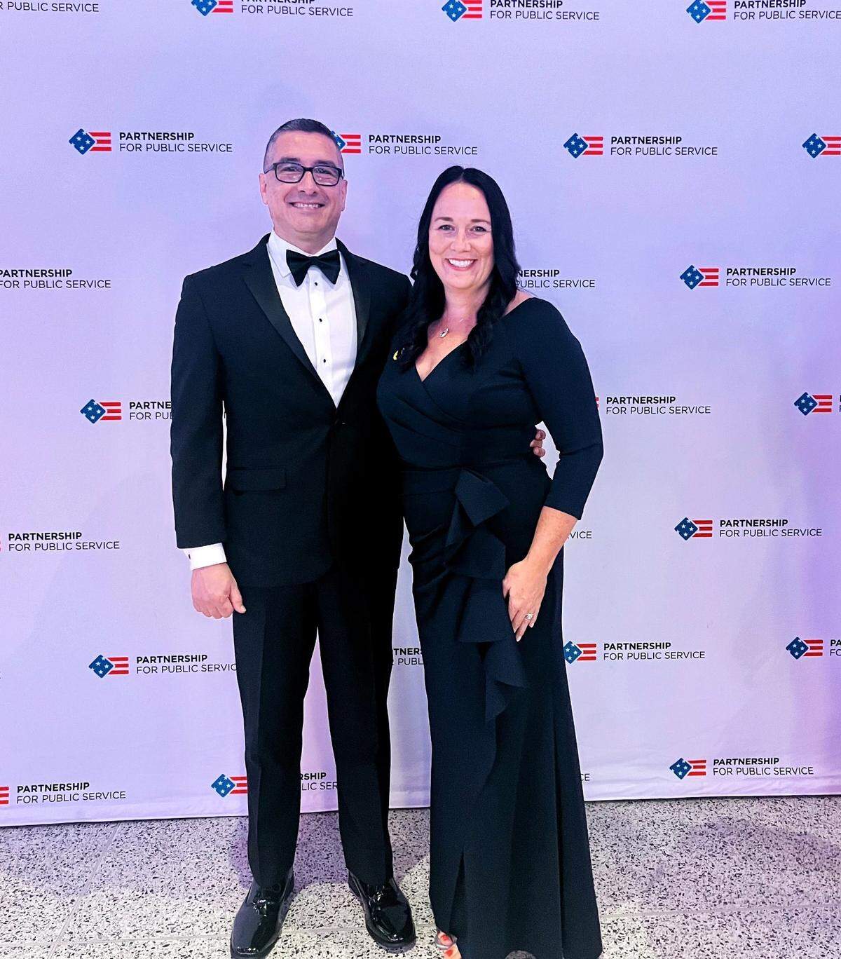 Juan and Shannon Rebolledo at the ceremony where she was named one of three federal workers of the year after her investigation of children working in meatpacking plants. Shannon Rebolledo said she did give her husband, a police officer, a bit of teasing shade over the award since it was for an investigation.