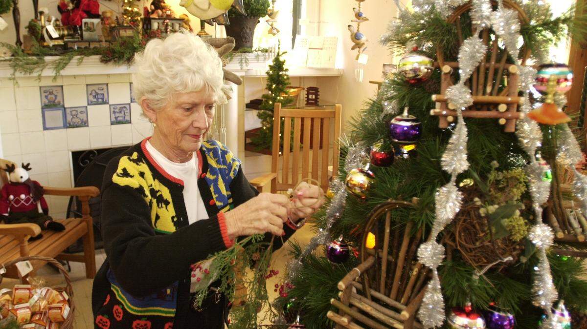 The late Nancy Farrow, shown in this 2002 file photo, started the Green Elephant Village near Central and Hillside in 1984. She closed her Green Elephant by Nancy shop late last year, and the center will be razed most likely next year.