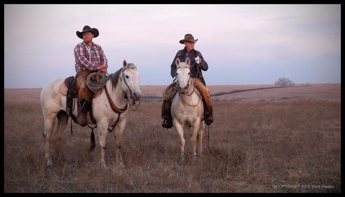 Josh Hoy, left, and his father Jim Hoy on horses in the Flint Hills in 2016. The men died a day apart in February. Their lives will be celebrated March 8 in Emporia.