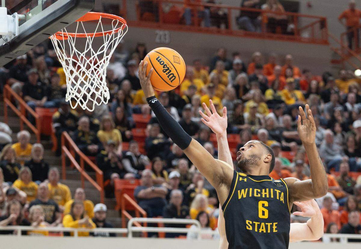 Wichita State’s Corey Washington gets a buckets during the the first half of their first round NIT game against Oklahoma State in Stillwater, Ok., on Tuesday night.