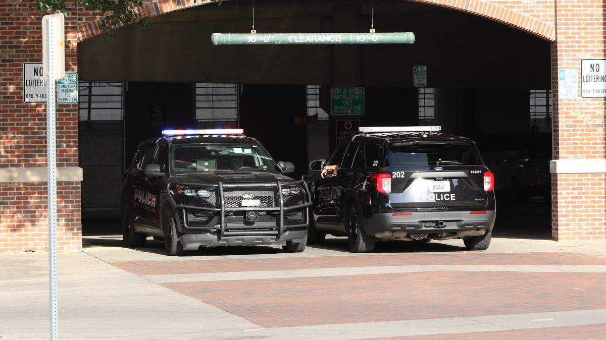 Police block the main entrance of the Wichita Old Town parking garage in late July after two people were found shot to death. Statistics for Old Town show that violent crime has ebbed and flowed over the past 11 years.