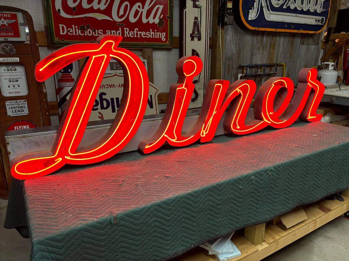 Alex Eftekhar’s buddy and fellow antiques enthusiast Benton West refurbished a 1940s-era neon sign that came off a restaurant in New York City.