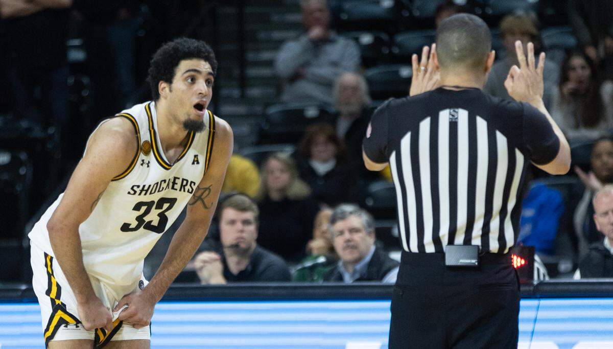 Wichita State’s James Rojas reacts after fouling out in overtime against Tulane on Wednesday night. The Green Wave went on to win 95-90.