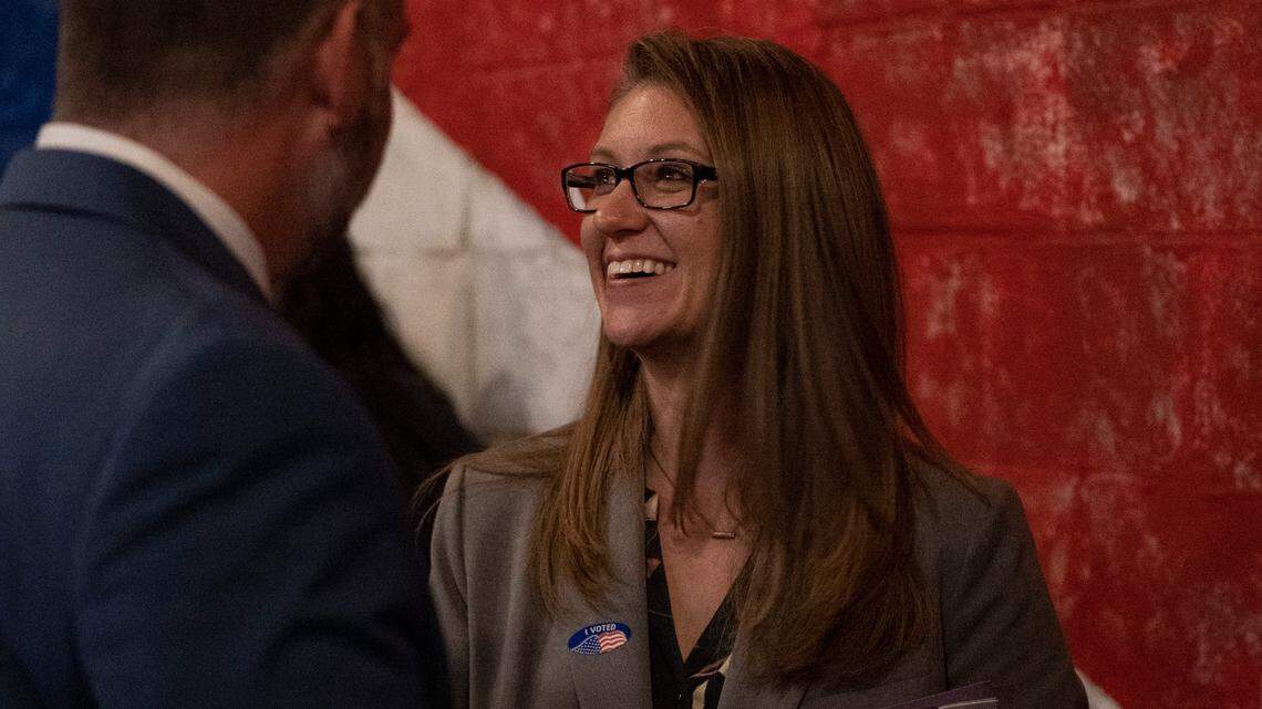 Diane Albert talks to a supporter during an election night party at B&C Creations. (November 2, 2021)