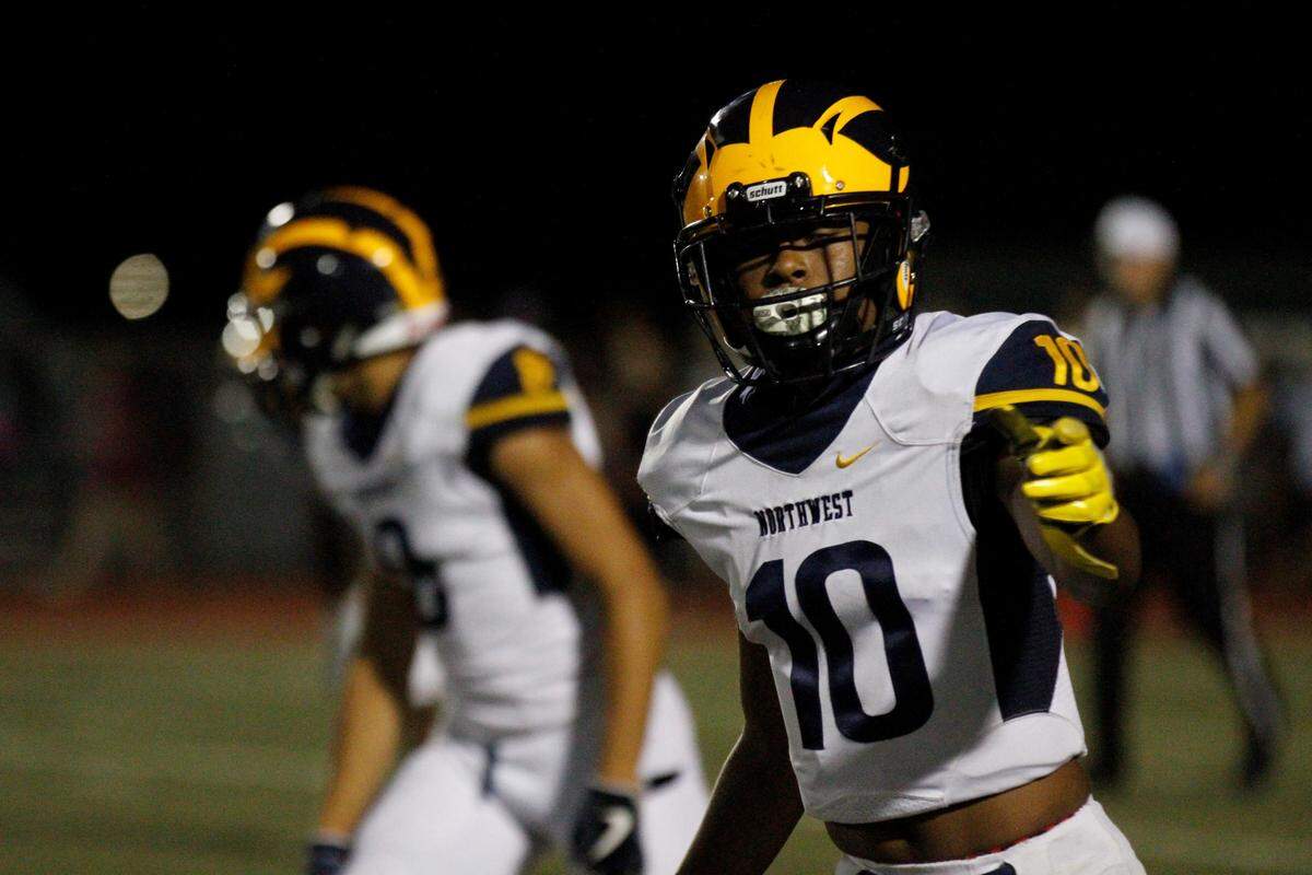 Wichita Northwest senior receiver Jamir Cupps checks with the official before the snap during the Grizzlies 23-22 win over the Bishop Carroll Golden Eagles on Friday night. (Aug. 31, 2018)
