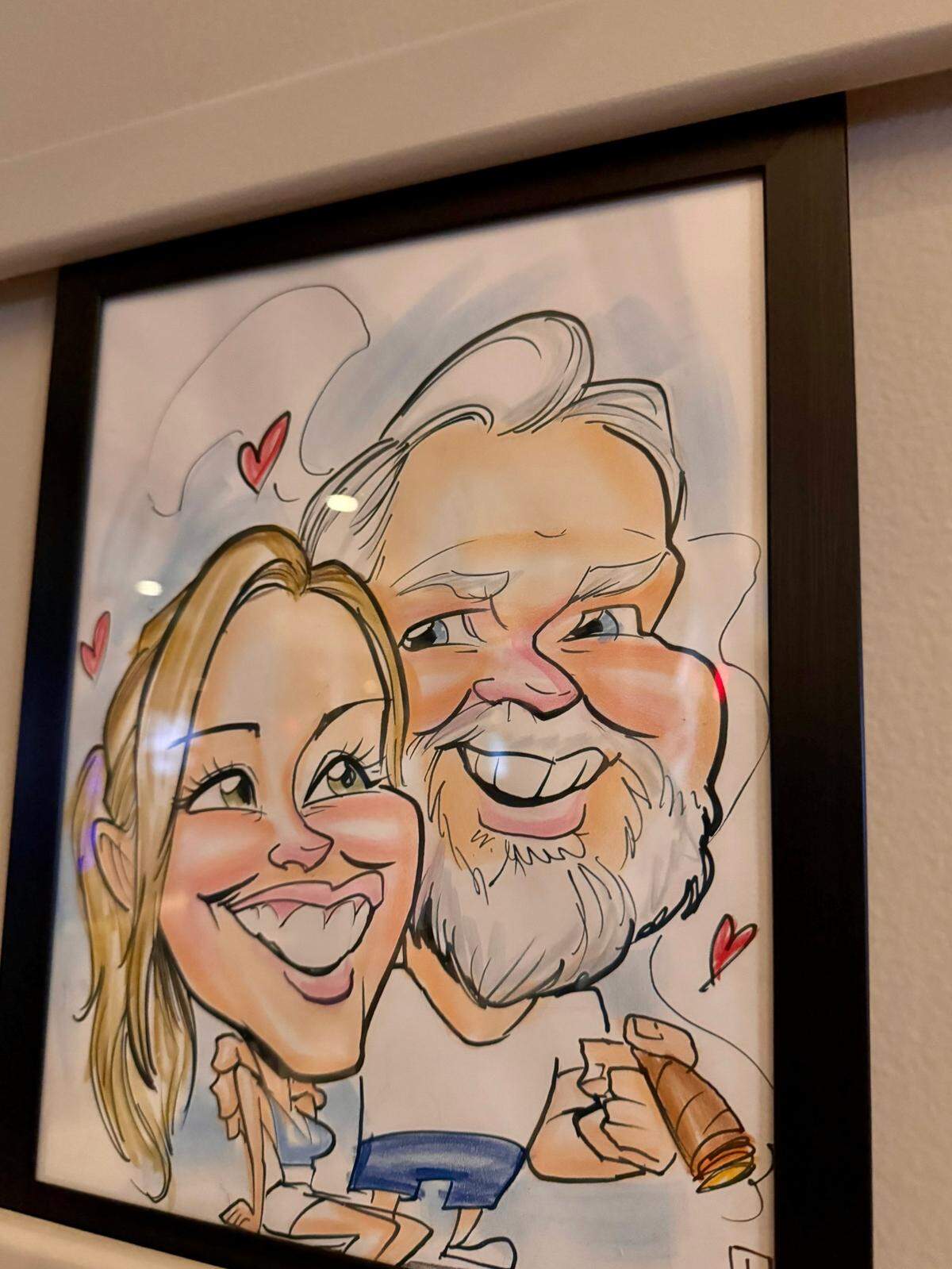 Sheet’s Creek owner Morrie Sheets is decorating his new restaurant with caricatures of his customers and friends. This one features Sheets and his wife, Jana.