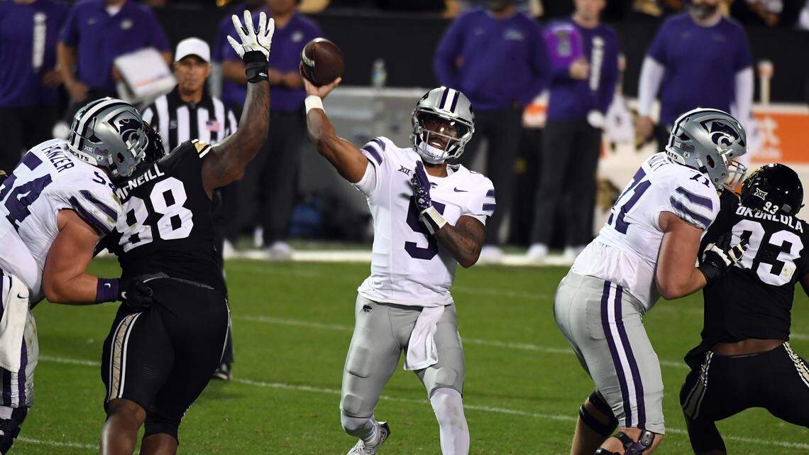 Kansas State Wildcats quarterback Ta’Quan Roberson (5) attempts a pass during the second half against the Colorado Buffaloes at Folsom Field. Mandatory