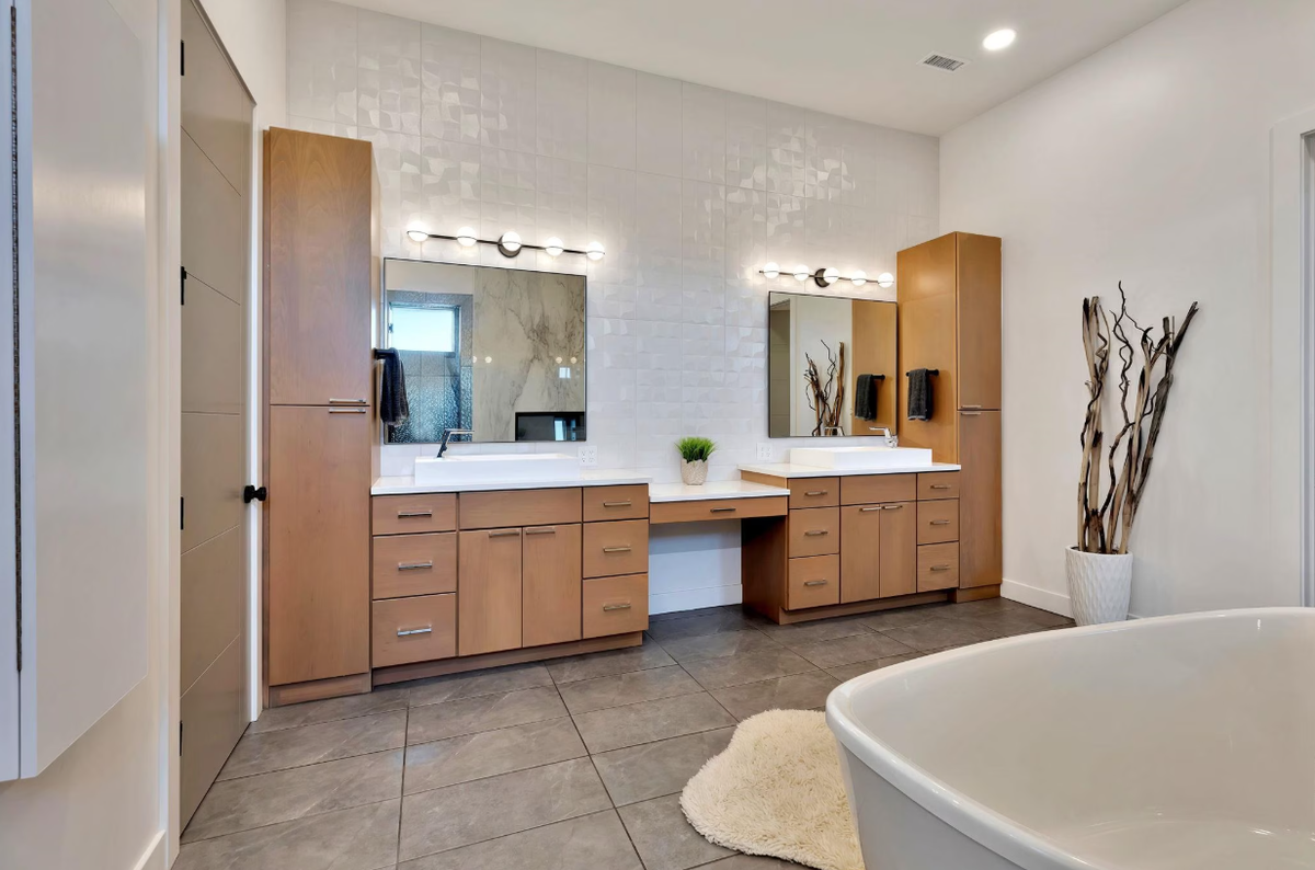A look inside the primary suite’s bathroom with a dual sink at 4835 W. Brisco in west Wichita.
