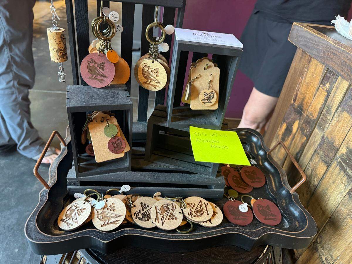 All Alzavino merch, including key chains, earrings and T-shirts, is 40% off at the sale.