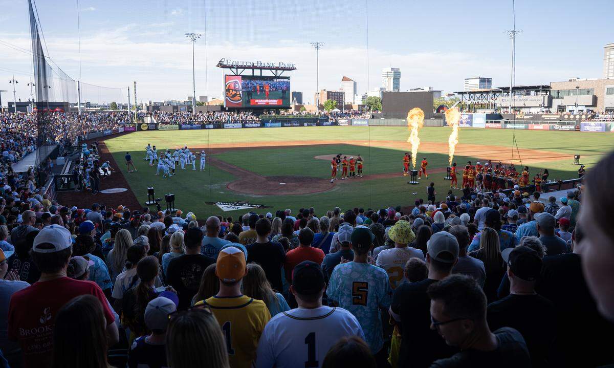 The Loco Beach Coconuts and Firefighters are two of six teams that make up the Banana Ball Championship League that played the first of a three-game series at Equity Bank Park on Thursday night. The stadium was sold out at 12,000 people attended.