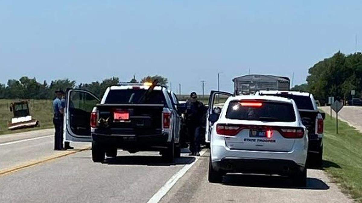 The Kansas Highway Patrol is investigating a crash between a semi truck and an SUV that killed a Kansas woman and two children on Tuesday