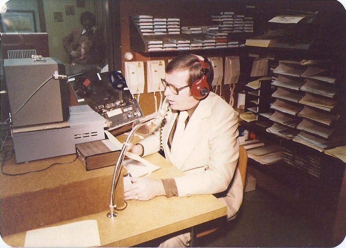 Larry Steckline working in a broadcasting booth in the 1970s.