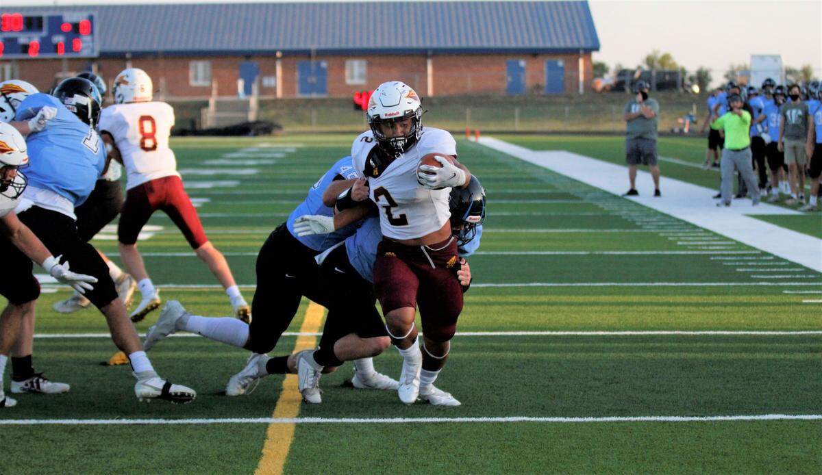 Hays’ Roy Moroni goes into the end zone against Eisenhower.