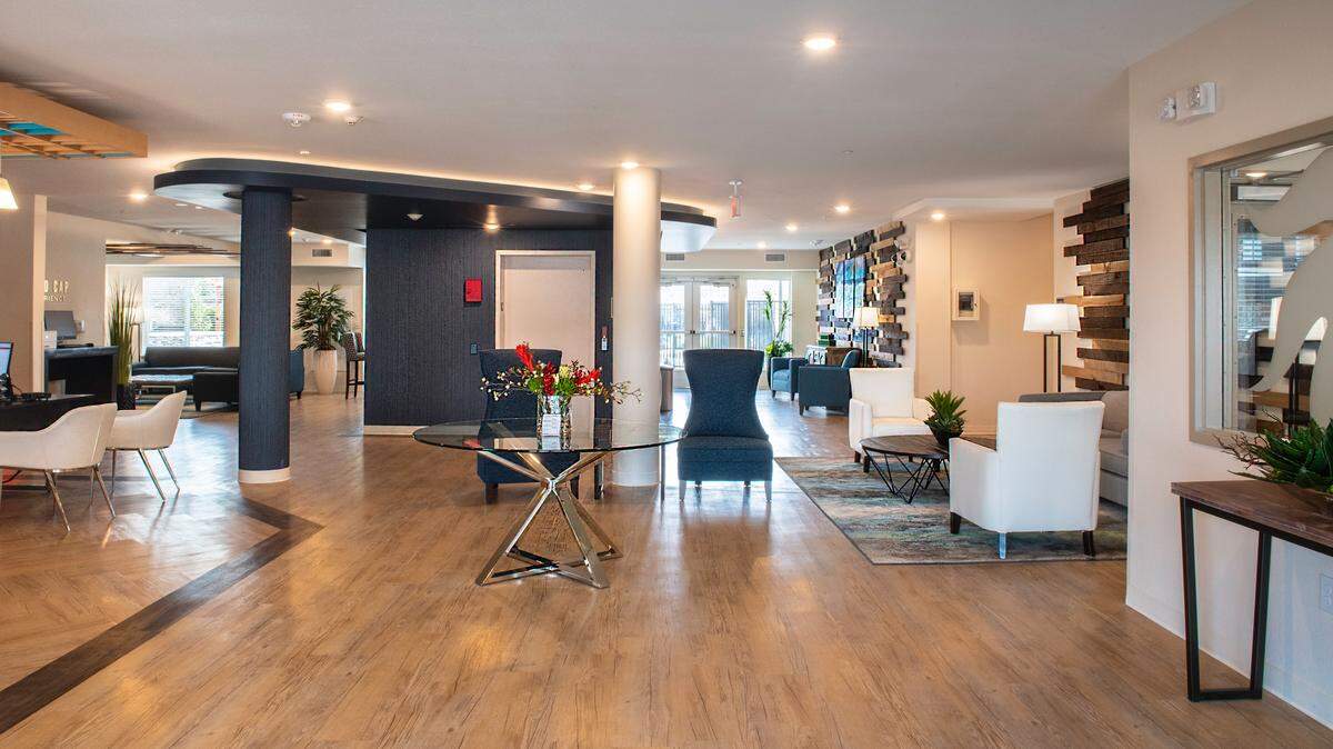 The newest Oakwood WaterWalk property in Overland Park features an open-concept lobby along with upgraded finishes and furniture.