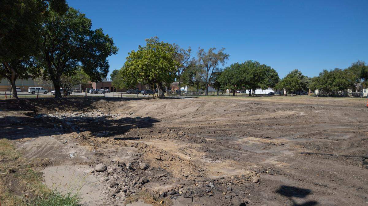 Land is being cleared at the corner of Handley and Texas for a new apartment complex called the Dumont.