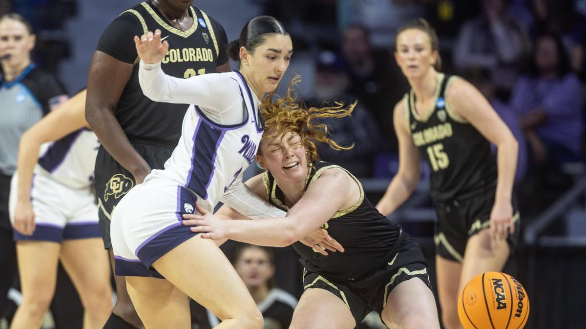 Kansas State’s Jaelyn Glenn, left, attempts to steal the ball from Colorado’s Frida Formann during the second half of Sunday’s NCAA Tournament game in Manhattan.