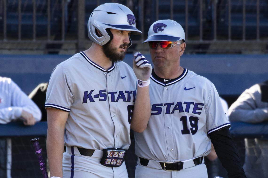 K-State baseball coach Pete Hughes has a chat with sophomore Terrence Spurlin (Courtesy Photo from K-State athletics)