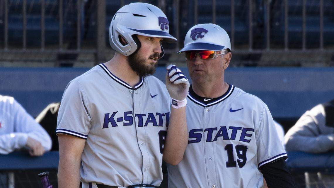 K-State baseball coach Pete Hughes has a chat with sophomore Terrence Spurlin (Courtesy Photo from K-State athletics)