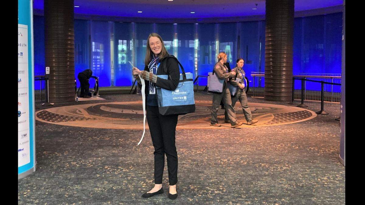 Wichita engineer Kim Burton, a senior manager in product support for Textron Aviation, was at the Eisenhower National Airport on Wednesday flying out to California to a conference for women in aviation and discovered one of the Wichita Public Library’s short story dispensers.