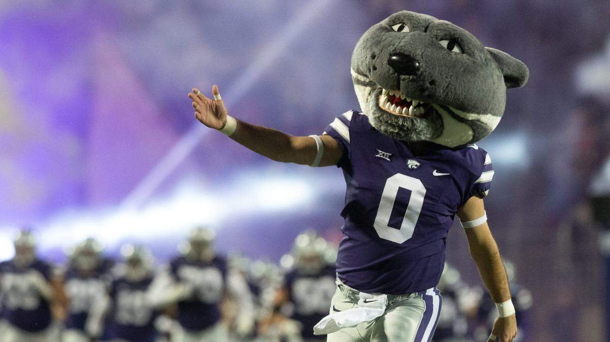 Willie the Wildcat brings out Kansas State players before the start of the 121st Sunflower Showdown game against Kansas inside Bill Snyder Family Stadium.