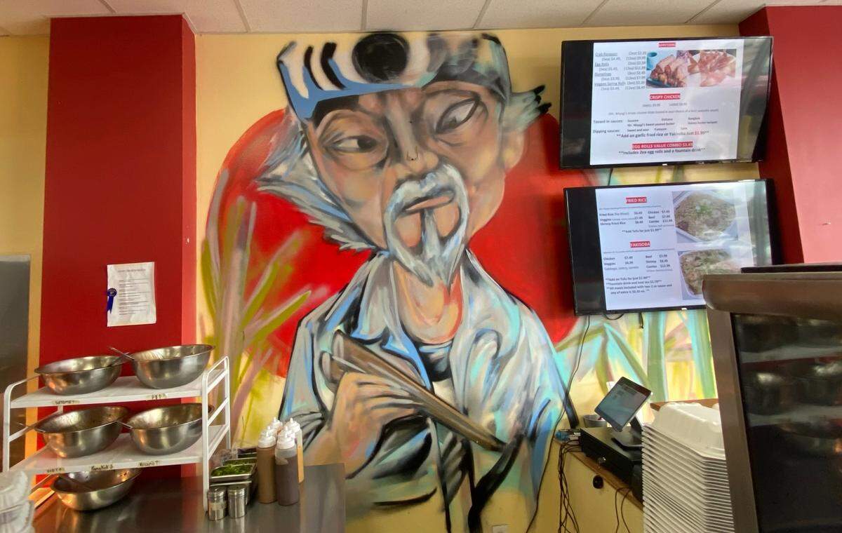 A mural of “The Karate Kid’s” Mr. Miyagi decorates the wall at Mr. Miyagi Japanese Grill.