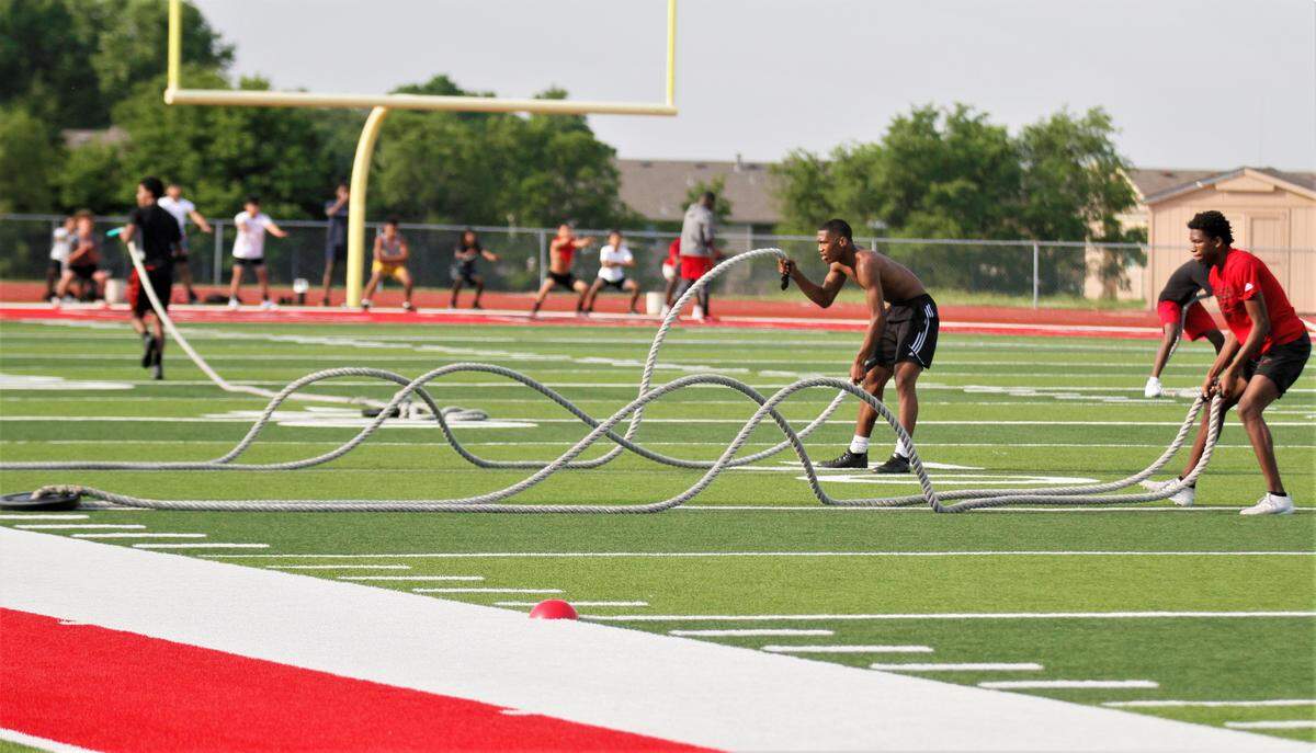 Wichita Heights football players hit the field for the first time after restrictions were lifted.