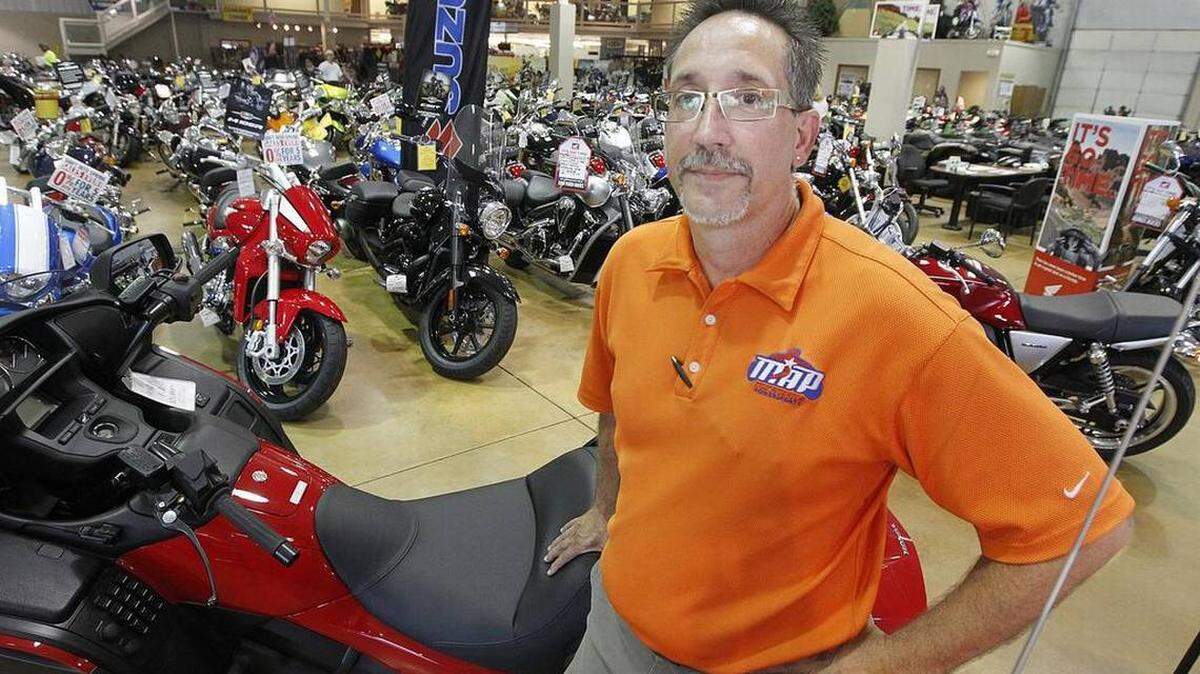 Ross Reed says he’s open to selling his Mid America Powersports, but the for-sale sign outside the business is for the property sale only.