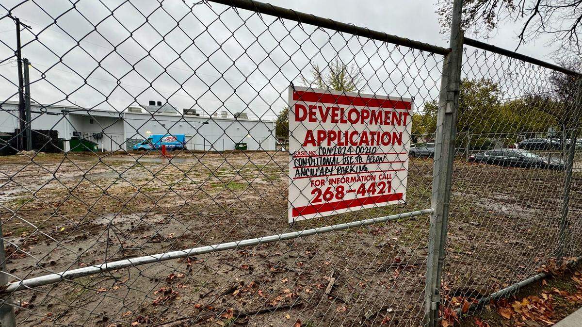 The lot behind The Belmont and Larcher’s Market in College Hill has been empty since 2021, when the owners had two old houses torn down. Soon, the space be filled with a landscaped parking lot.