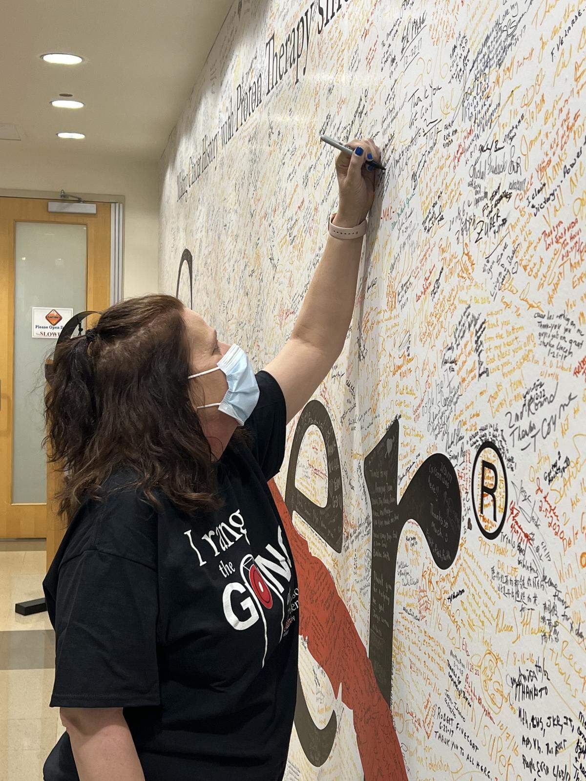 Patients also get to sign their names on the wall after completing radiation at MD Anderson, and I found a tiny spot to leave my mark.