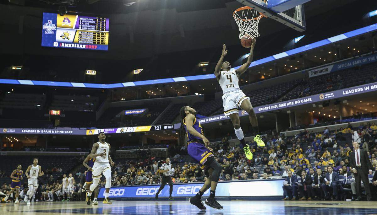 Wichita State guard Samajae Haynes-Jones makes a breakaway layup against East Carolina during the first half of their game in Memphis on Thursday.