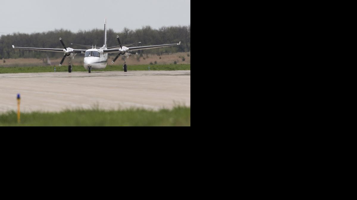 An airplane lands at Jabara Airport in northeast Wichita.