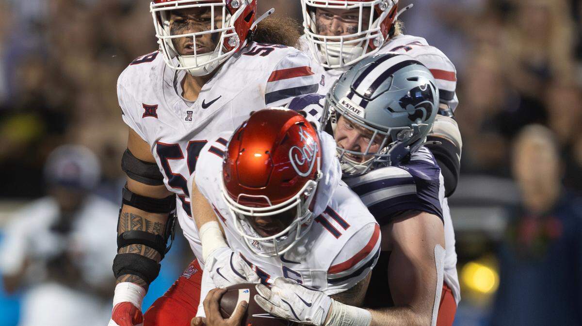 Kansas State’s Brendan Mott sacks Arizona quarterback Noah Fifita during the third quarter of their game on Friday night at Bill Snyder Family Stadium.