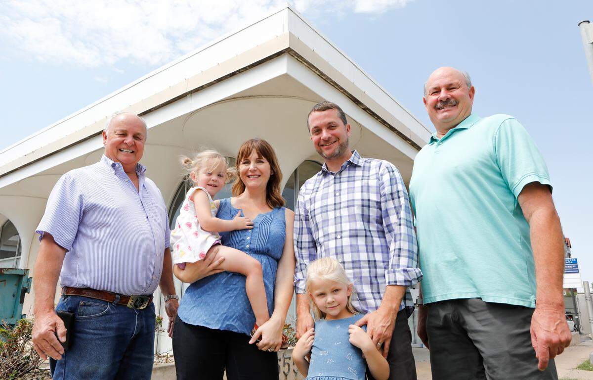 Tory DeMarce, second from right, along with his wife, Wichita native Melanie Zepick DeMarce, are putting plans for the Belmont in College Hill on hold until the pandemic is over. Marc White, right, Brad White, left, former owners of Happiness Plaza, are also pictured.