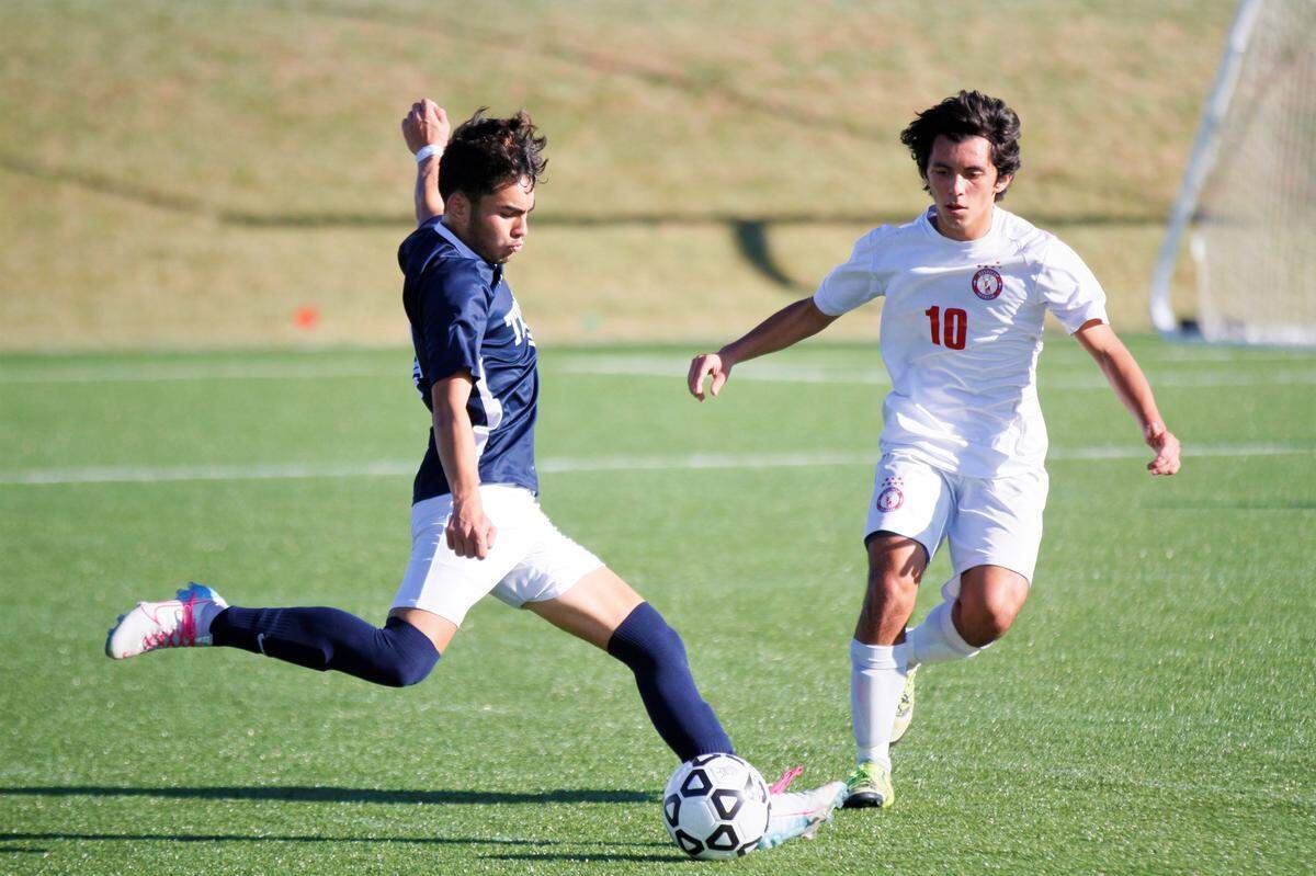 Trinity’s Kai Kan and Bishop Miege’s Diego Olivas